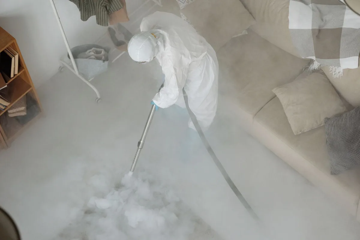 Biohazard cleanup technician in protective equipment, Warrenton, VA